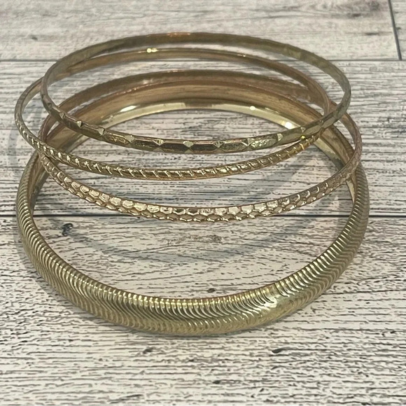 Set of 4 gold tone bangles - Picture 1 of 6
